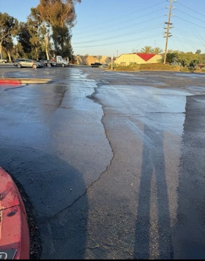 Commercial parking lot washed corner to corner in overnight sections