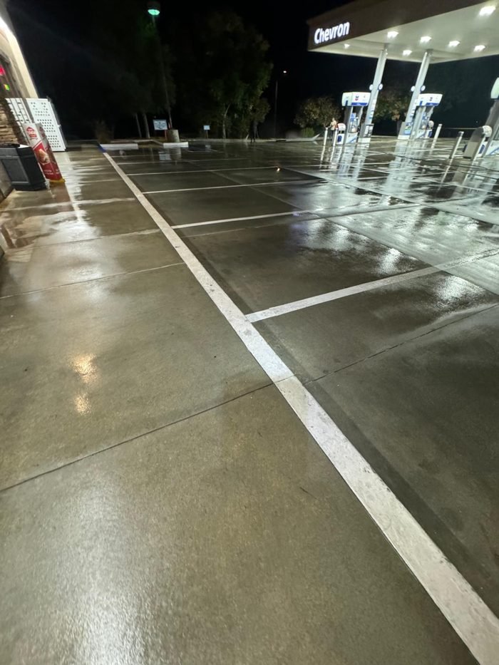 Fuel-station forecourt, canopy, or concrete cleaning