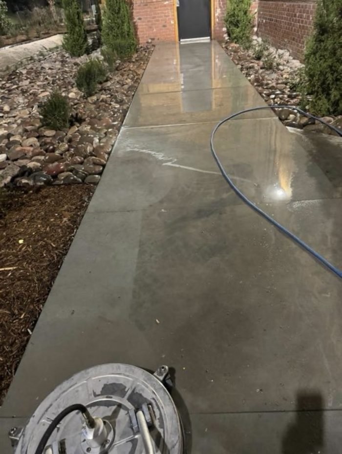 Walkway detail work at a commercial property, rinse in progress