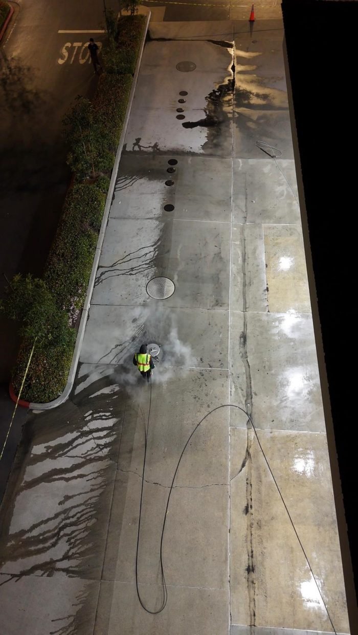Commercial parking or drive-area pressure washing