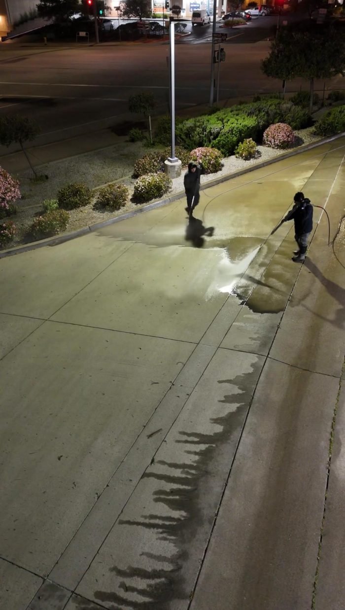 Commercial parking or drive-area pressure washing