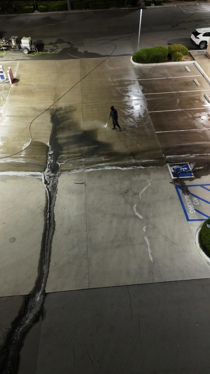 Commercial parking or drive-area pressure washing